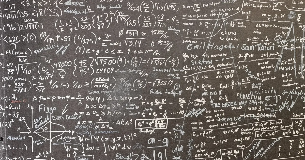 Mathematical equations written on a chalkboard