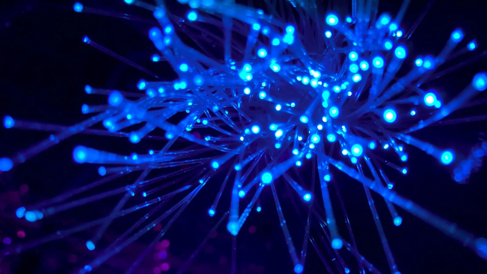 An abstract glowing network representing frontier AI systems under evaluation