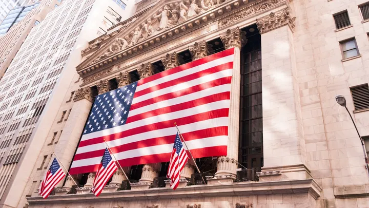 A flag outside a stock exchange building