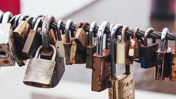 Padlocks attached to a cable, symbolizing cryptographic proof