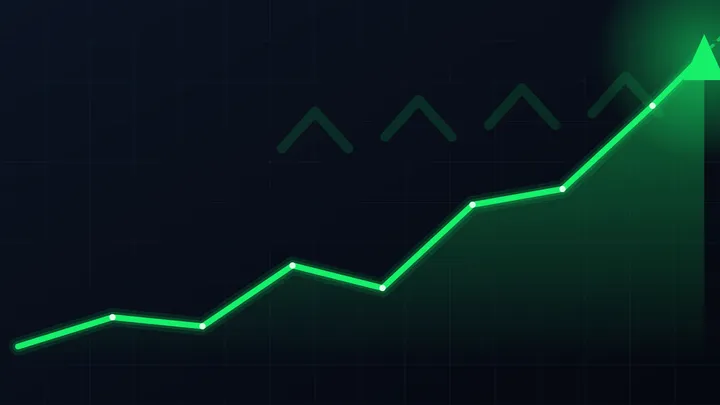 A stock ticker display glowing green with rising share prices